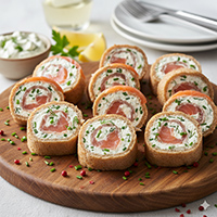 Roulés saumon fromage frais à l'ail et aux fines herbes 